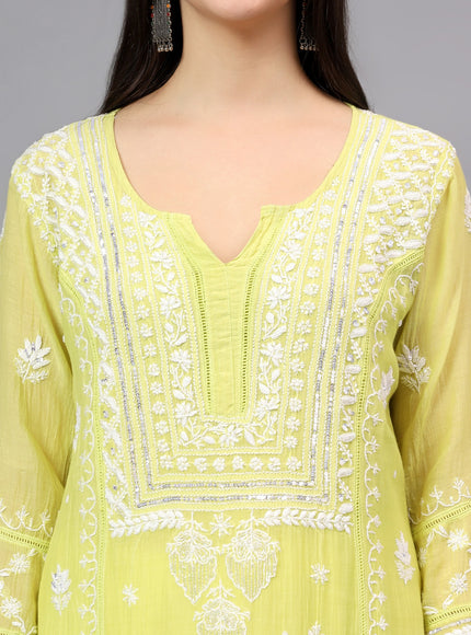 Pure Mal Chanderi Kurta embroidered  with lucknowi chikankari and beautiful Dardozi embellishment.