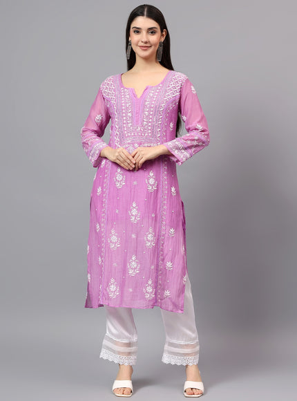Pure Mal Chanderi Kurta embroidered  with lucknowi chikankari and beautiful Dardozi embellishment.